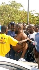 Bank customer resists robbers, seizes rifle, shoots&hellip;